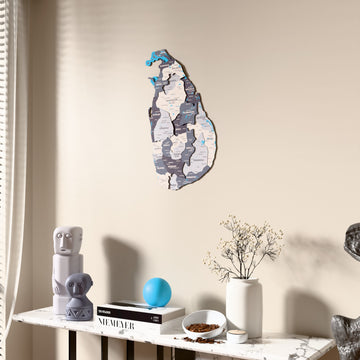 Nimbus Sri Lanka wooden wall map beside a sheer curtain, angled view