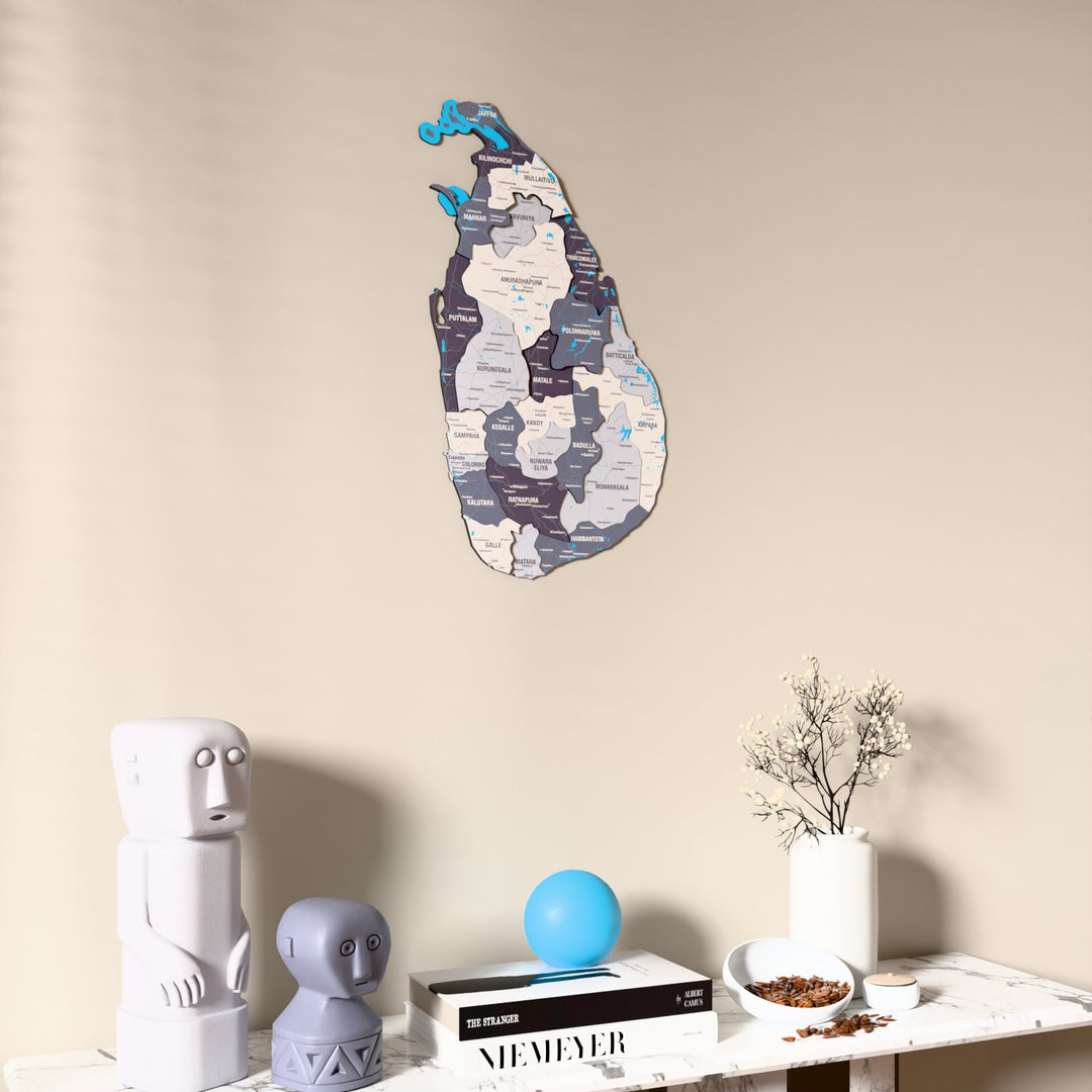 Nimbus Sri Lanka wooden wall map on a beige wall above a console with figurines