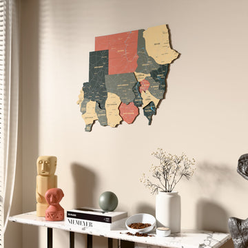 Sage Sudan wooden wall map beside a sheer curtain, angled view