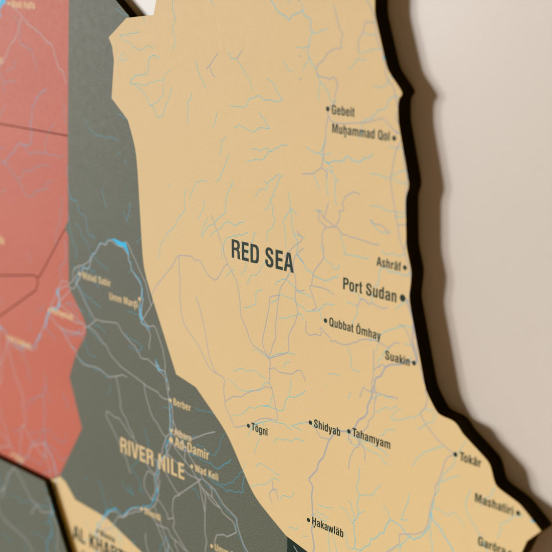 Close-up of the Sage Sudan wooden wall map with layered regions and printed names