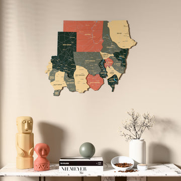 Sage Sudan wooden wall map above a marble console, front view