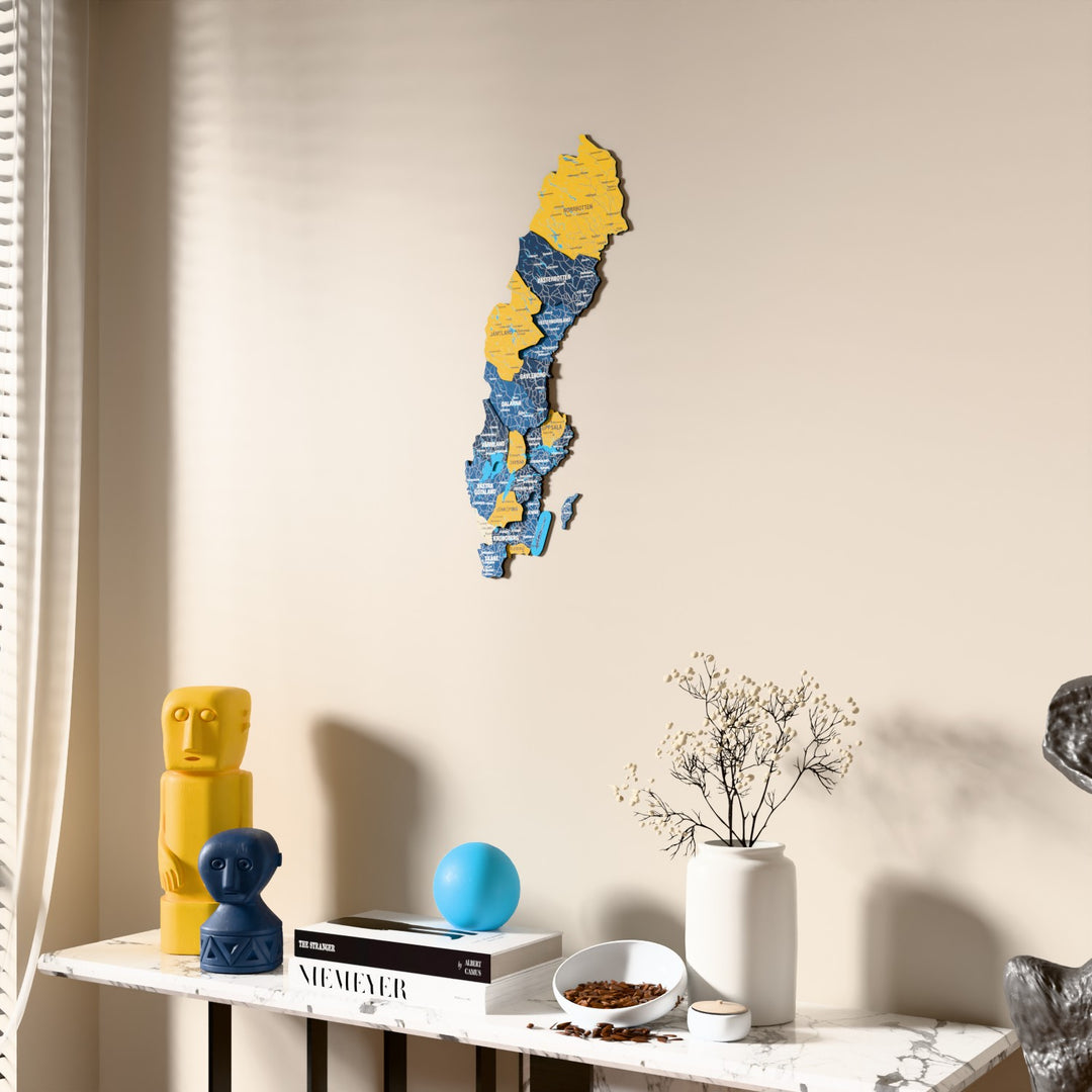 Flag colored Sweden wooden wall map beside a sheer curtain, angled view
