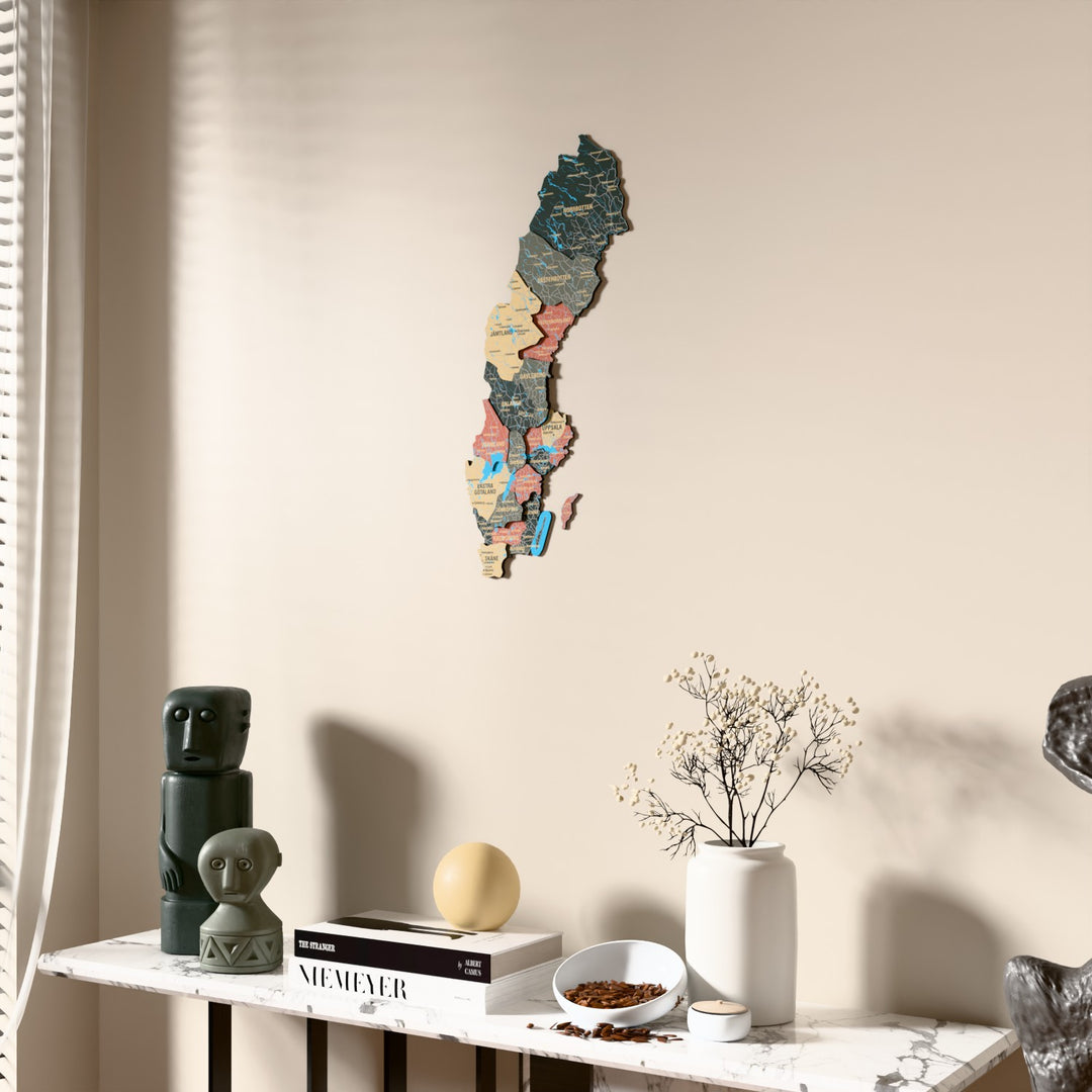Sage Sweden wooden wall map beside a sheer curtain, angled view