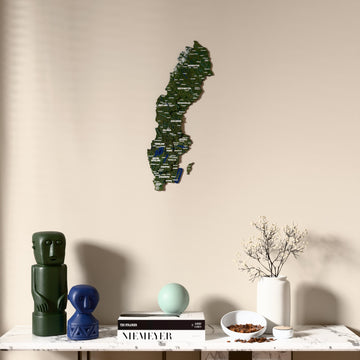 Satellite Sweden wooden wall map above a marble console, front view