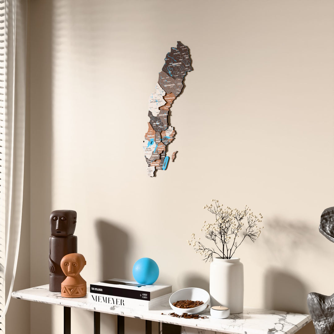 Soil Sweden wooden wall map beside a sheer curtain, angled view