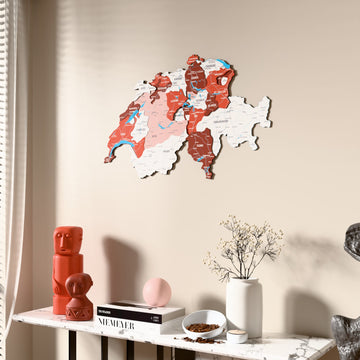 Flag colored Switzerland wooden wall map beside a sheer curtain, angled view