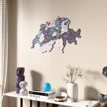 Nimbus Switzerland wooden wall map beside a sheer curtain, angled view