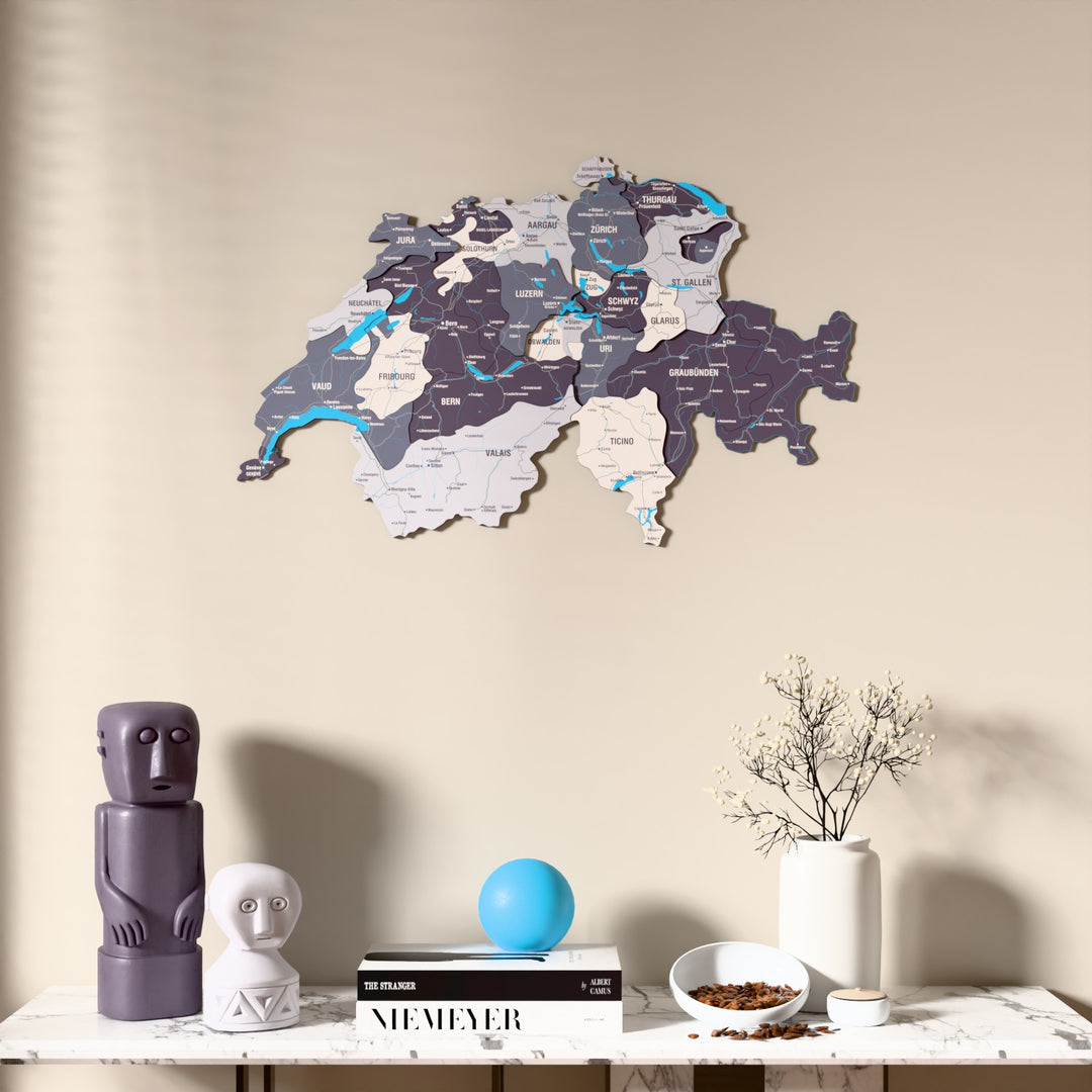 Nimbus Switzerland wooden wall map above a marble console, front view
