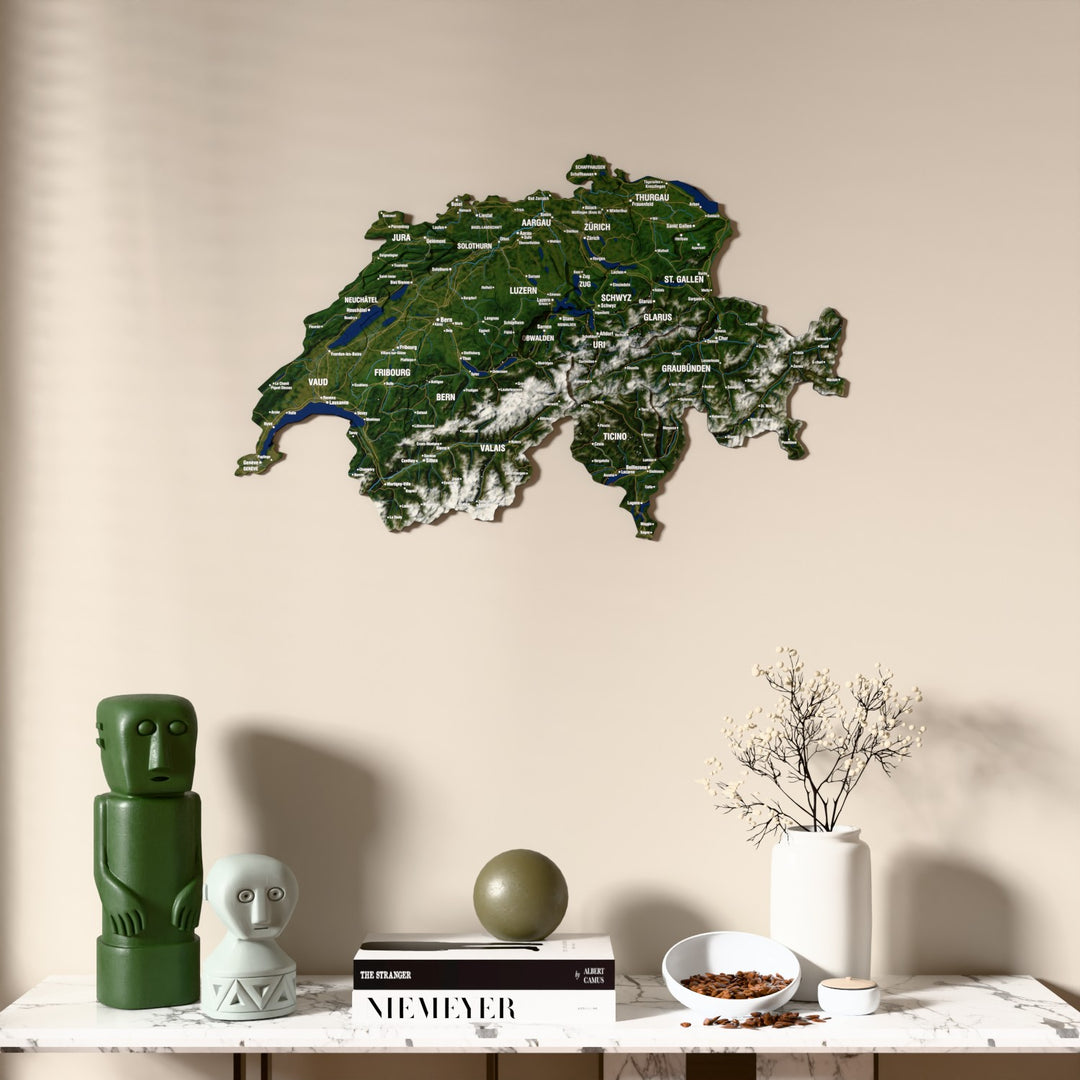 Satellite Switzerland wooden wall map above a marble console, front view
