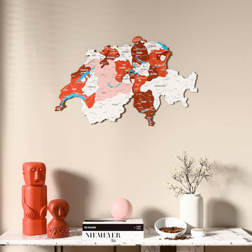 Flag colored Switzerland wooden wall map above a marble console, front view