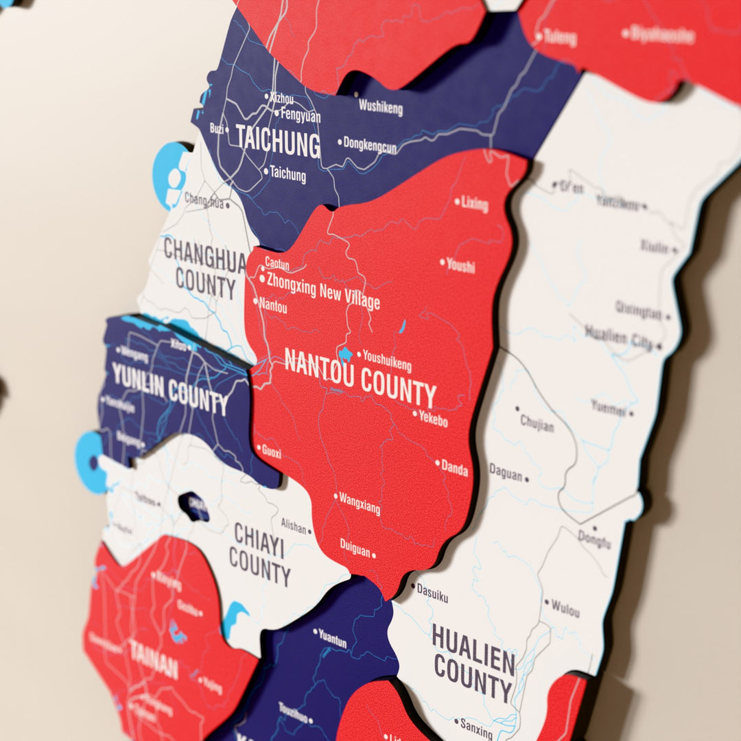 Close-up of the Flag colored Taiwan wooden wall map with layered regions and printed names