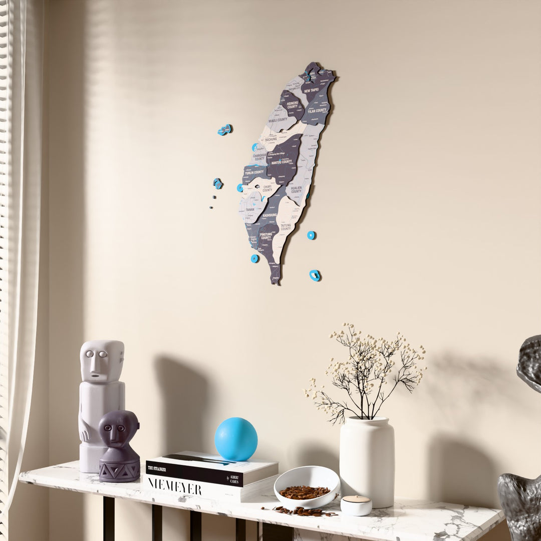 Nimbus Taiwan wooden wall map beside a sheer curtain, angled view