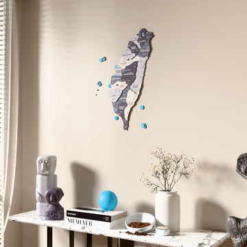 Nimbus Taiwan wooden wall map beside a sheer curtain, angled view