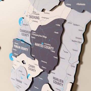 Close-up of the Nimbus Taiwan wooden wall map with layered regions and printed names