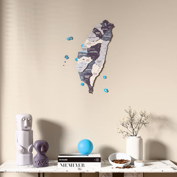 Nimbus Taiwan wooden wall map above a marble console, front view