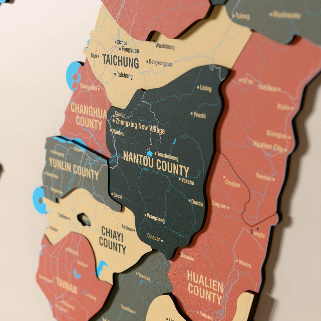 Close-up of the Sage Taiwan wooden wall map with layered regions and printed names