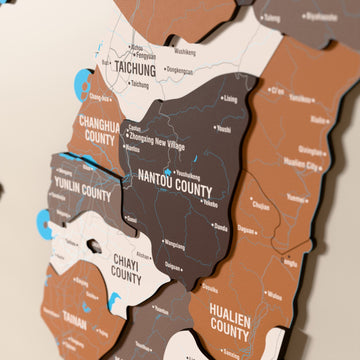 Close-up of the Soil Taiwan wooden wall map with layered regions and printed names