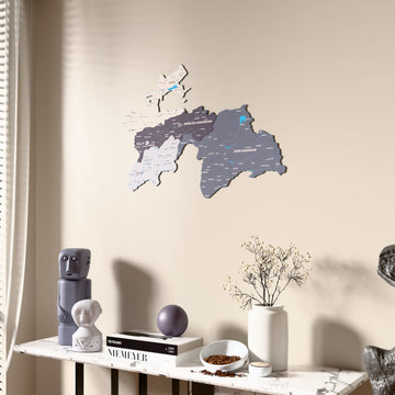 Nimbus Tajikistan wooden wall map beside a sheer curtain, angled view