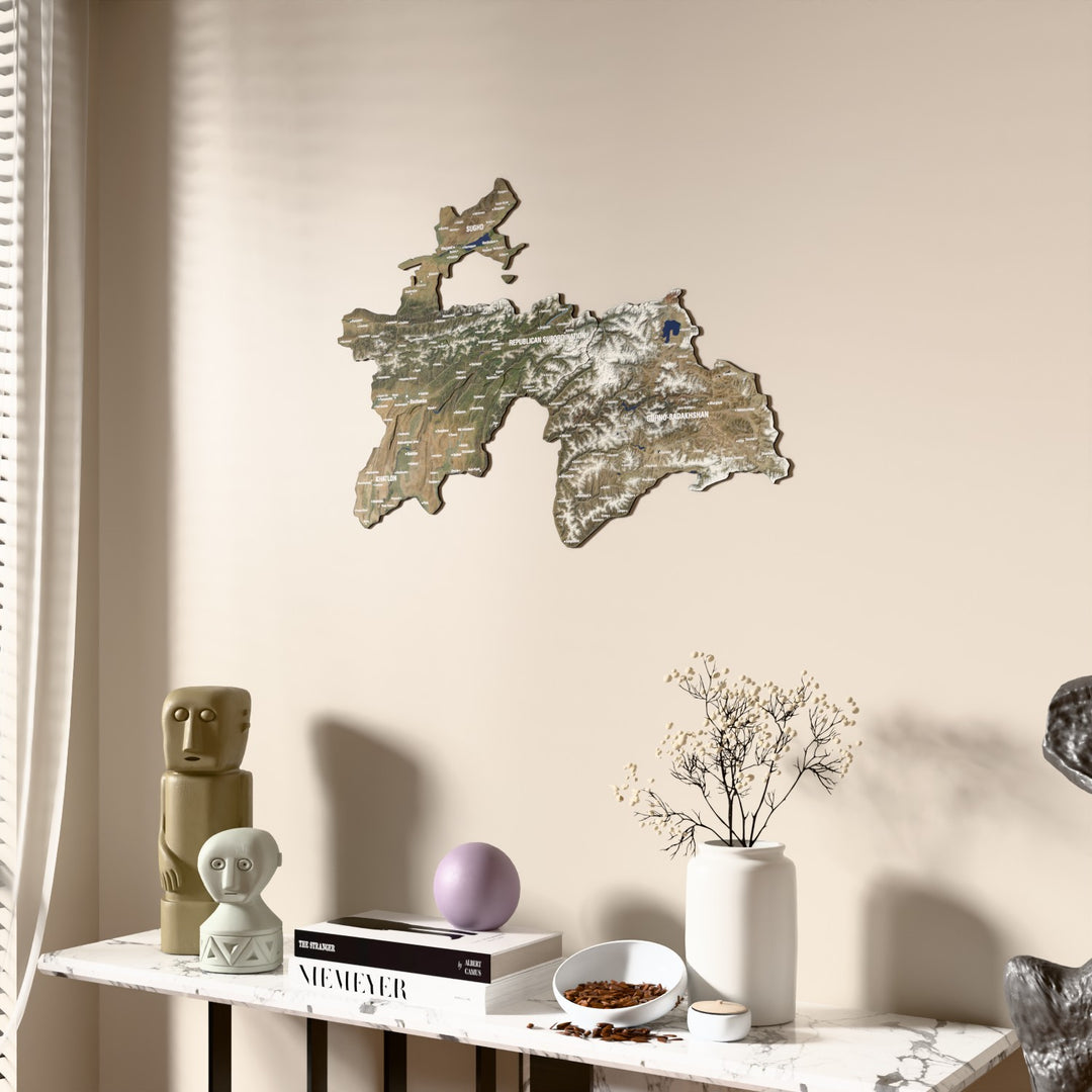Satellite Tajikistan wooden wall map beside a sheer curtain, angled view