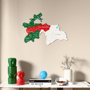Flag colored Tajikistan wooden wall map above a marble console, front view