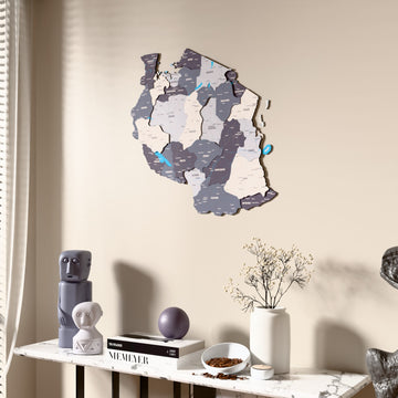Nimbus Tanzania wooden wall map beside a sheer curtain, angled view