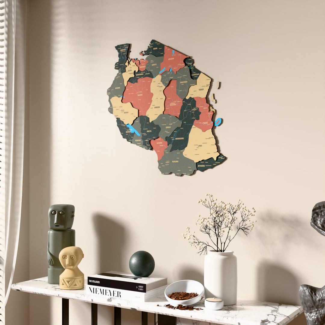 Sage Tanzania wooden wall map beside a sheer curtain, angled view