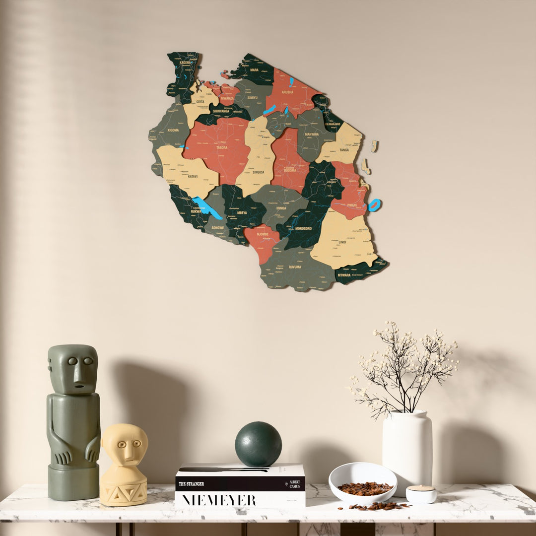 Sage Tanzania wooden wall map above a marble console, front view