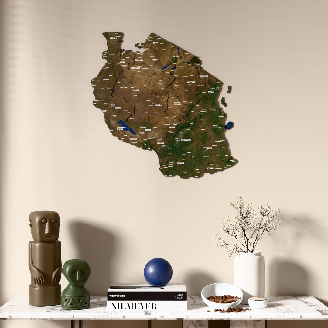 Satellite Tanzania wooden wall map above a marble console, front view