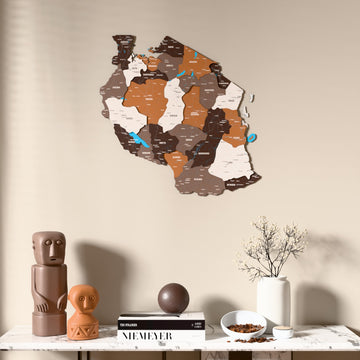 Soil Tanzania wooden wall map above a marble console, front view
