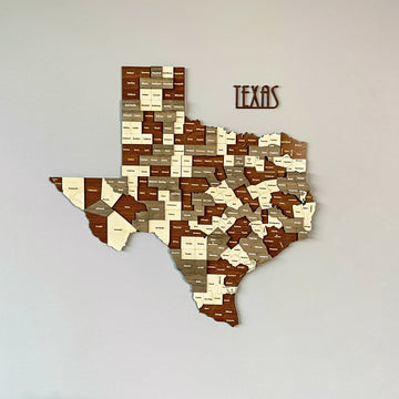 60 cm Texas wooden wall map in brown, cream and gray county pieces with TEXAS lettering, front view