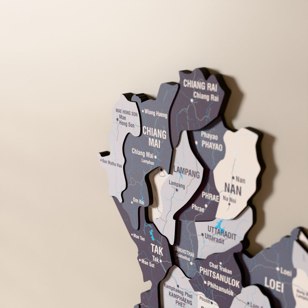 Close-up of the Nimbus Thailand wooden wall map with layered regions and printed names