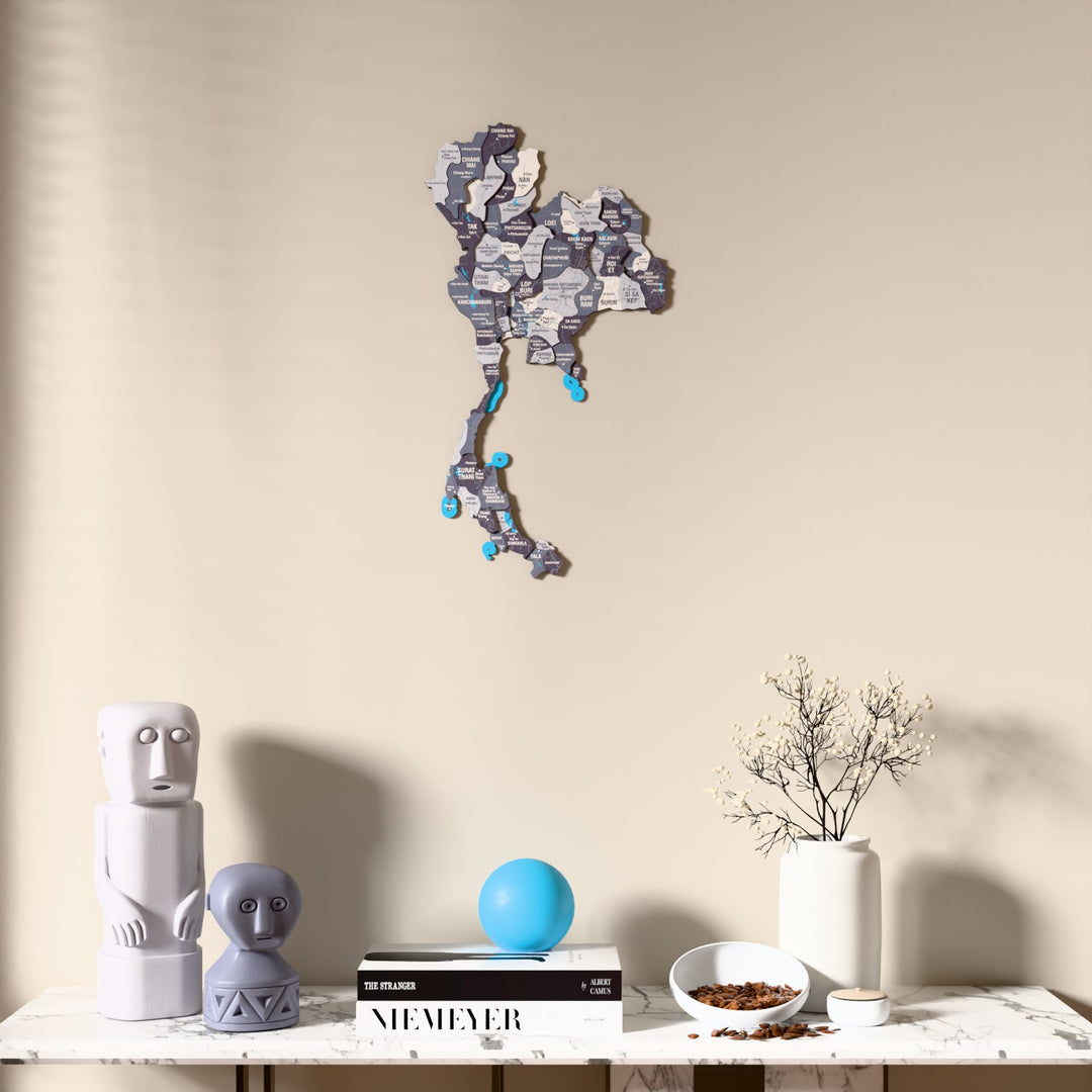 Nimbus Thailand wooden wall map above a marble console, front view