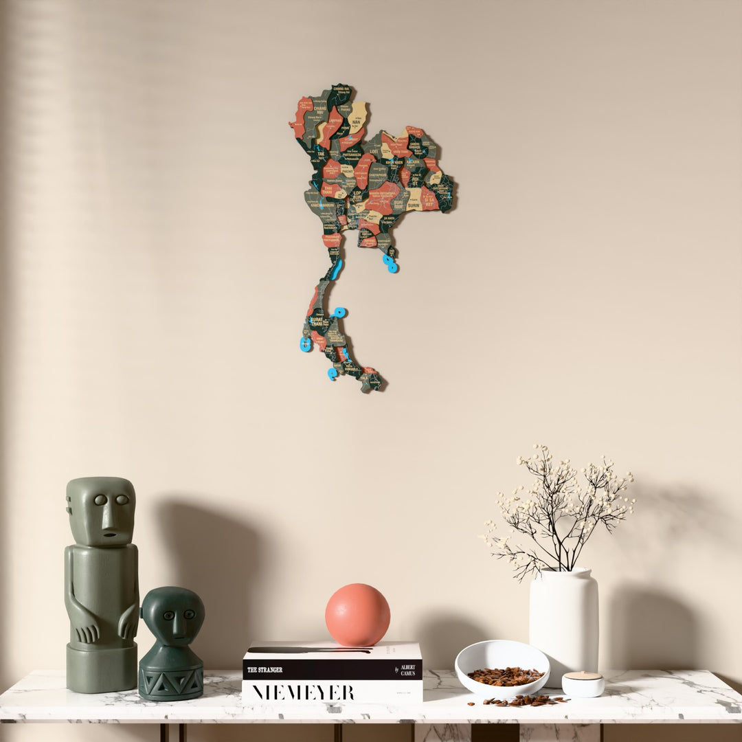 Sage Thailand wooden wall map above a marble console, front view