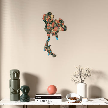 Sage Thailand wooden wall map above a marble console, front view