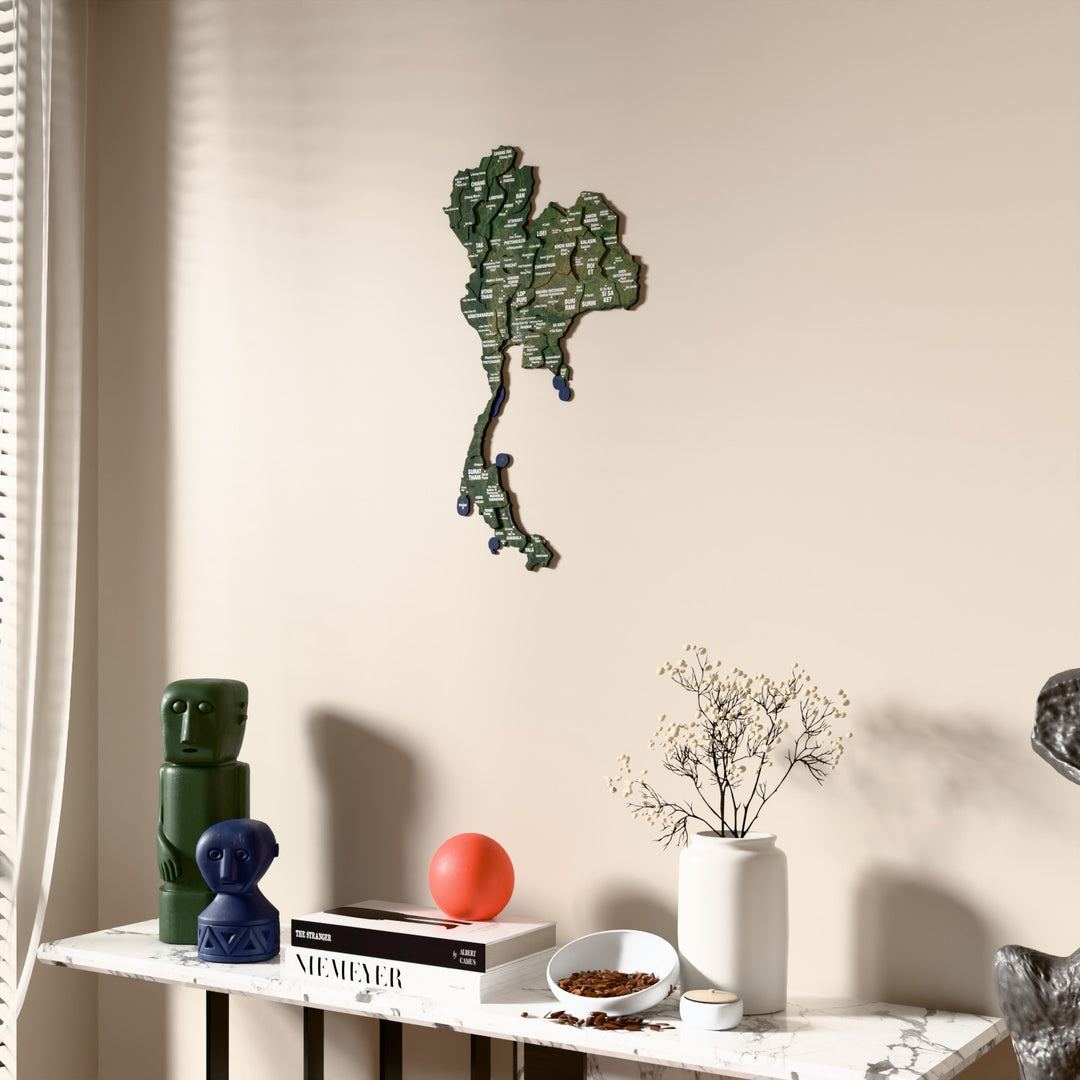 Satellite Thailand wooden wall map beside a sheer curtain, angled view