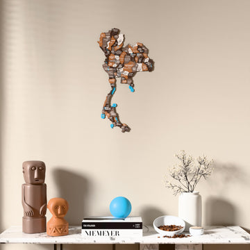 Soil Thailand wooden wall map above a marble console, front view