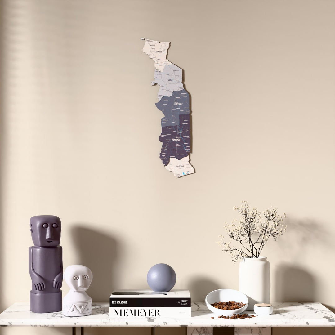 Nimbus Togo wooden wall map above a marble console, front view