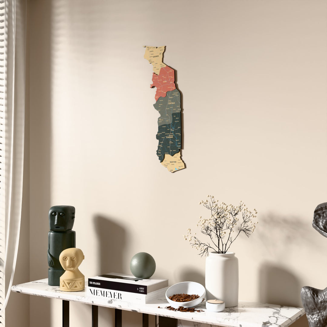 Sage Togo wooden wall map beside a sheer curtain, angled view