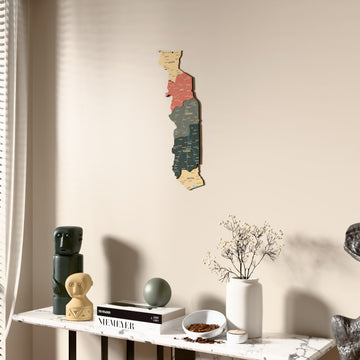 Sage Togo wooden wall map beside a sheer curtain, angled view