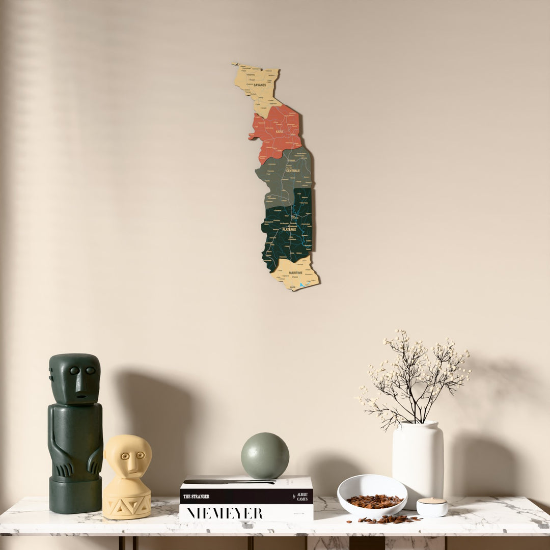 Sage Togo wooden wall map above a marble console, front view
