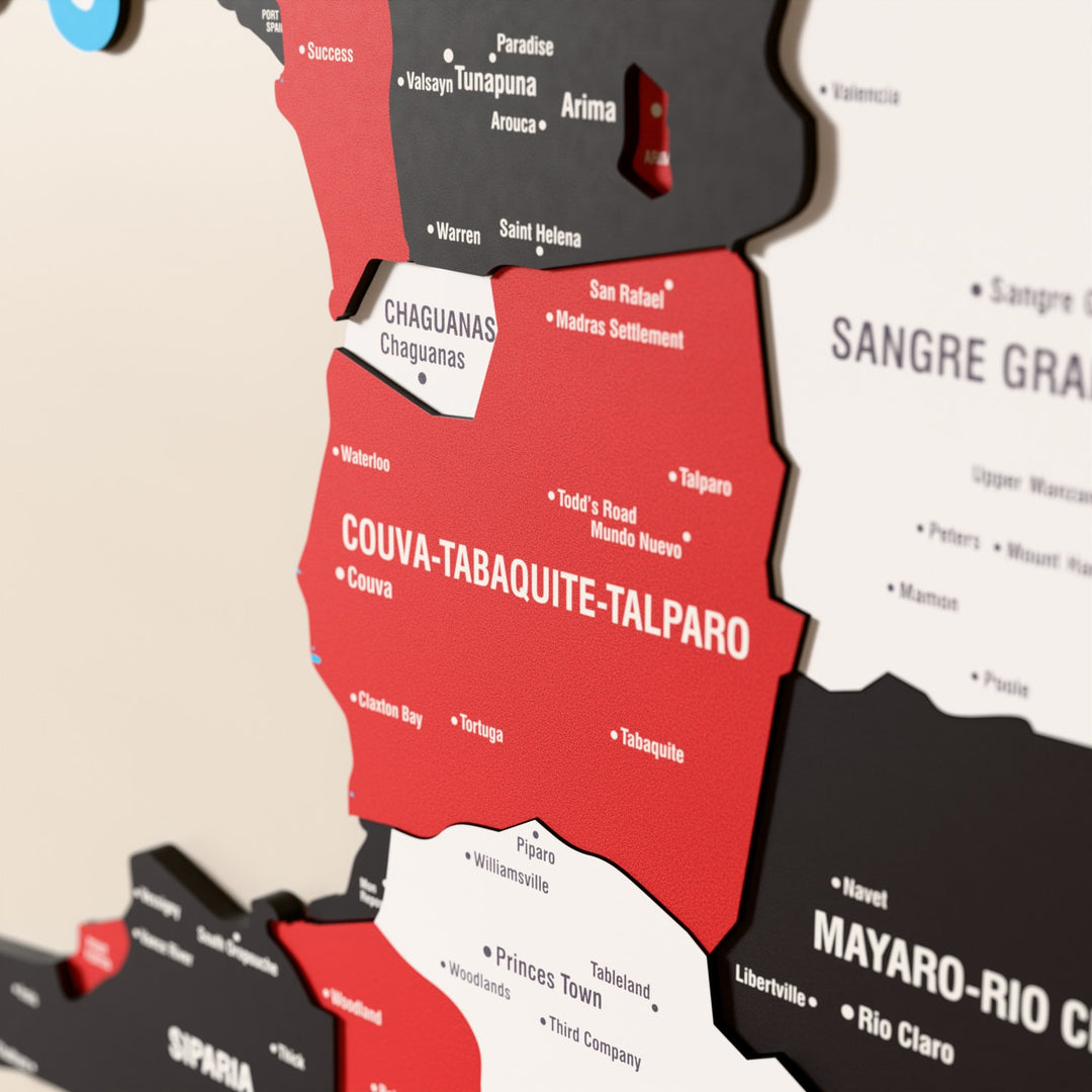 Close-up of the Flag colored Trinidad and Tobago wooden wall map with layered regions and printed names