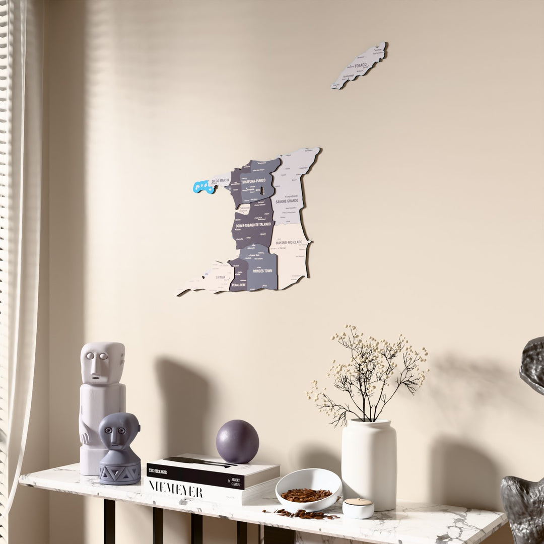 Nimbus Trinidad and Tobago wooden wall map beside a sheer curtain, angled view
