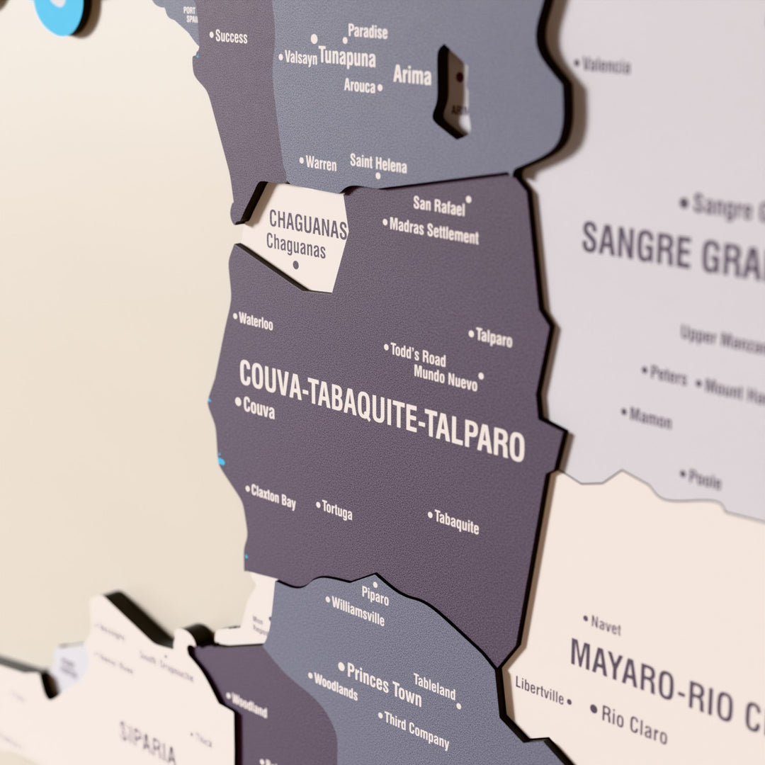 Close-up of the Nimbus Trinidad and Tobago wooden wall map with layered regions and printed names