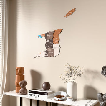 Soil Trinidad and Tobago wooden wall map beside a sheer curtain, angled view