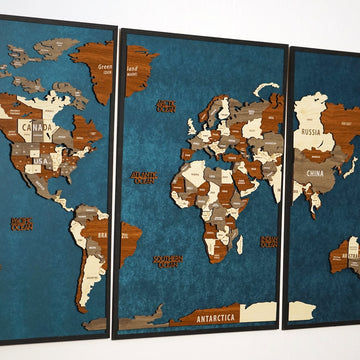 Close-up of the three-panel wooden world map with the Americas on the left panel and Europe and Africa in the center