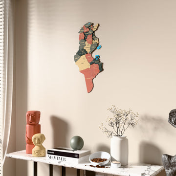 Sage Tunisia wooden wall map beside a sheer curtain, angled view