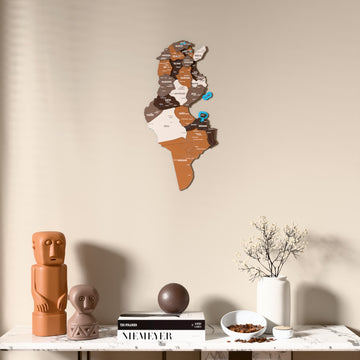 Soil Tunisia wooden wall map above a marble console, front view