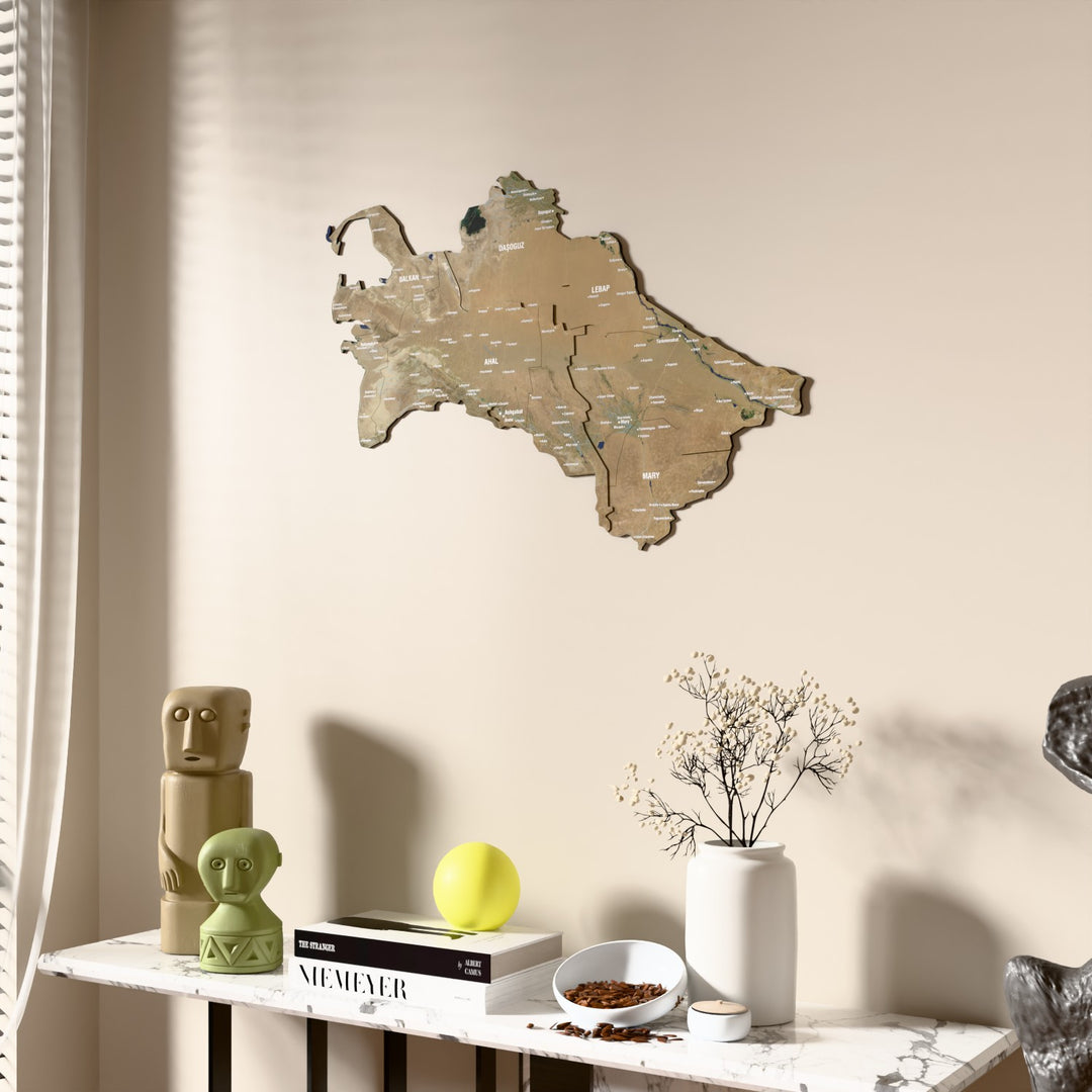 Satellite Turkmenistan wooden wall map beside a sheer curtain, angled view