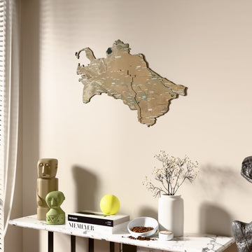 Satellite Turkmenistan wooden wall map beside a sheer curtain, angled view