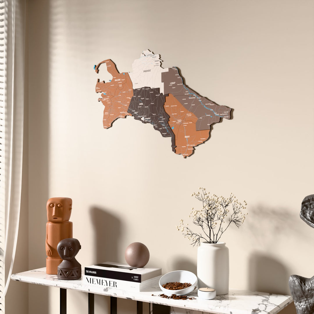 Soil Turkmenistan wooden wall map beside a sheer curtain, angled view